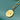 Vintage gold medallion necklace with heart motif on green jewelry box