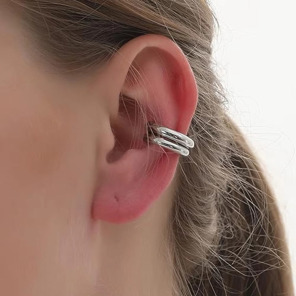 Set of two chunky silver ear cuffs with a polished finish