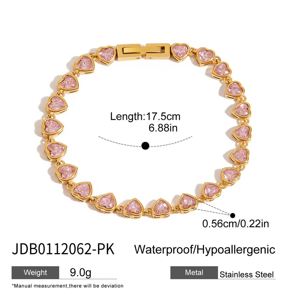 Gold bracelet with pink heart charms arranged in a full loop, clasped