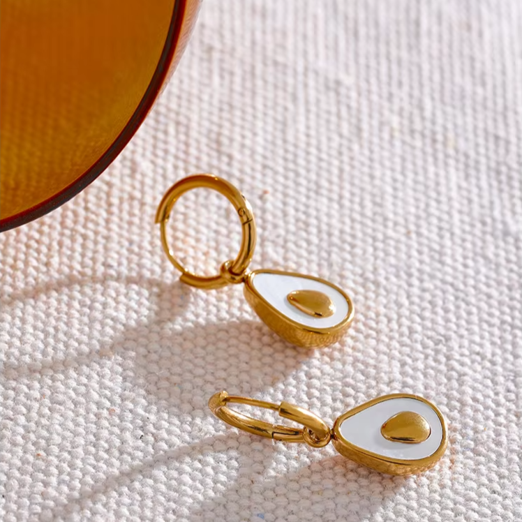 Avocado Drop Hoops with avocado-shaped charms and golden seed in waterproof PVD gold plated stainless steel