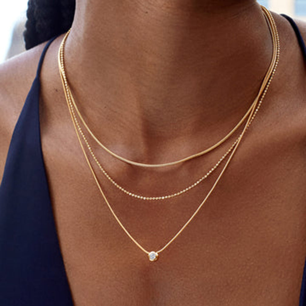 Glow Trio Layer – gold necklace
