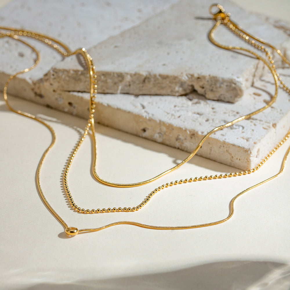 Glow Trio Layer – gold necklace