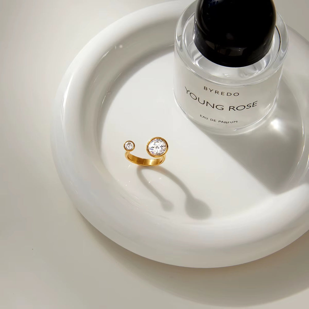 Radiant Orbit Ring – adjustable gold ring with cubic zirconia stones