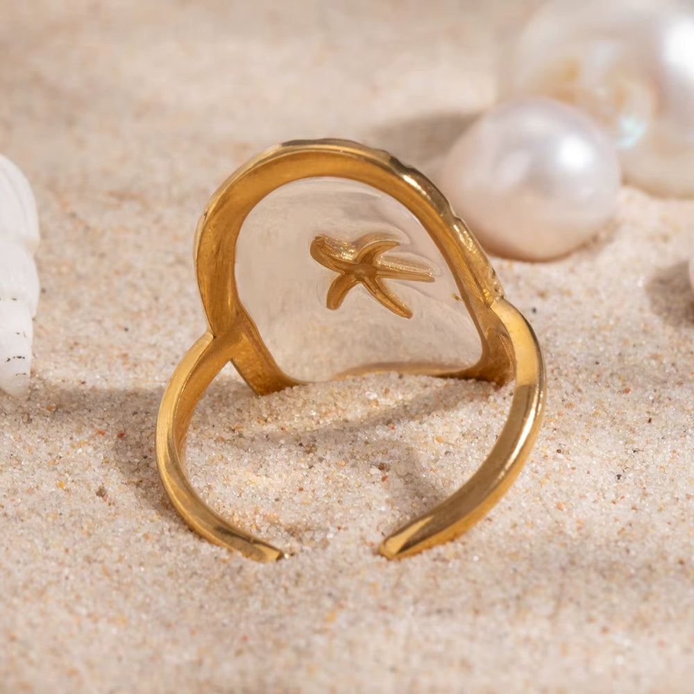 Stella – Starfish Ring – adjustable gold starfish ring with lilac base