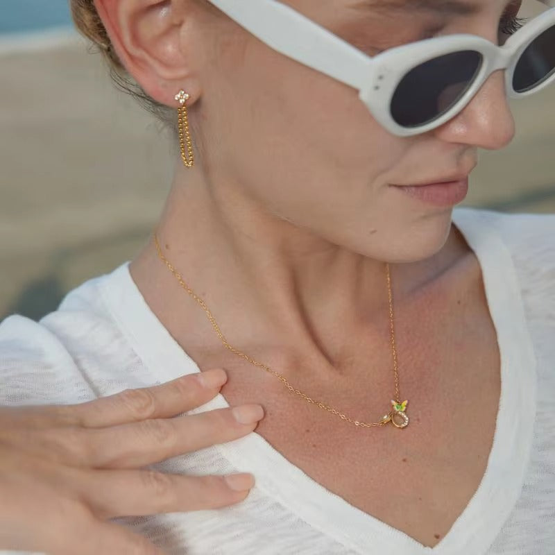 Butterfly Spark Necklace – gold necklace with enamel detail