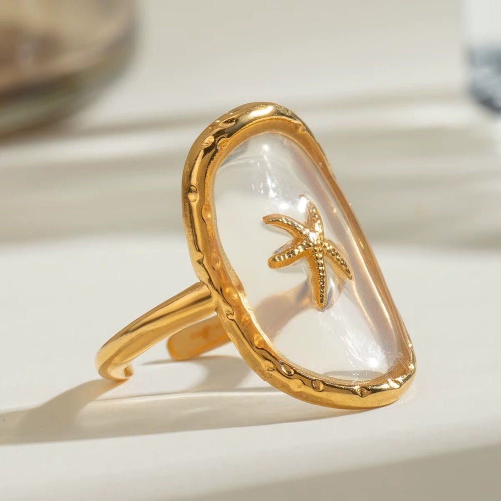 Stella – Starfish Ring – adjustable gold starfish ring with lilac base
