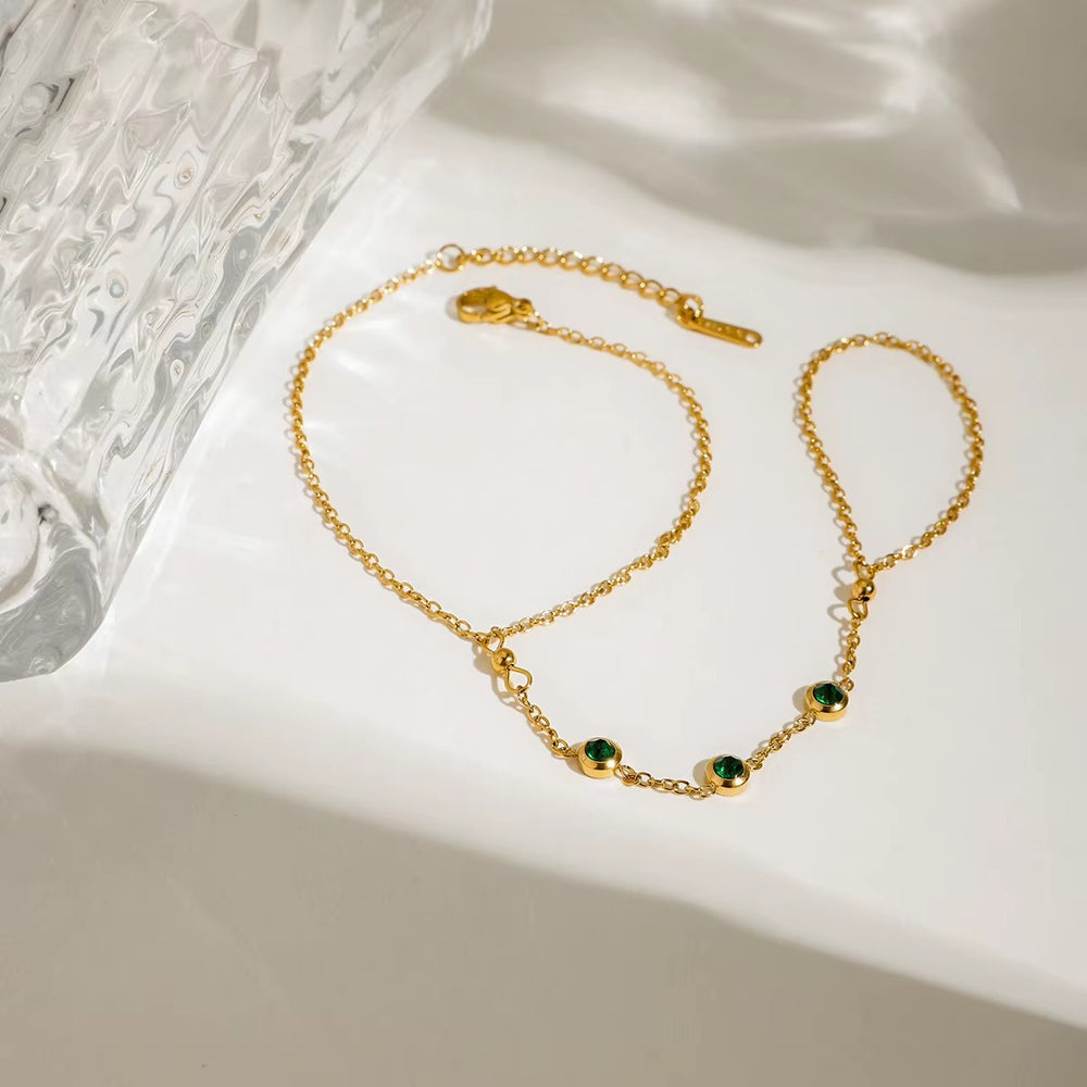 Emerald Link Hand Chain – gold hand chain with cubic zirconia stones