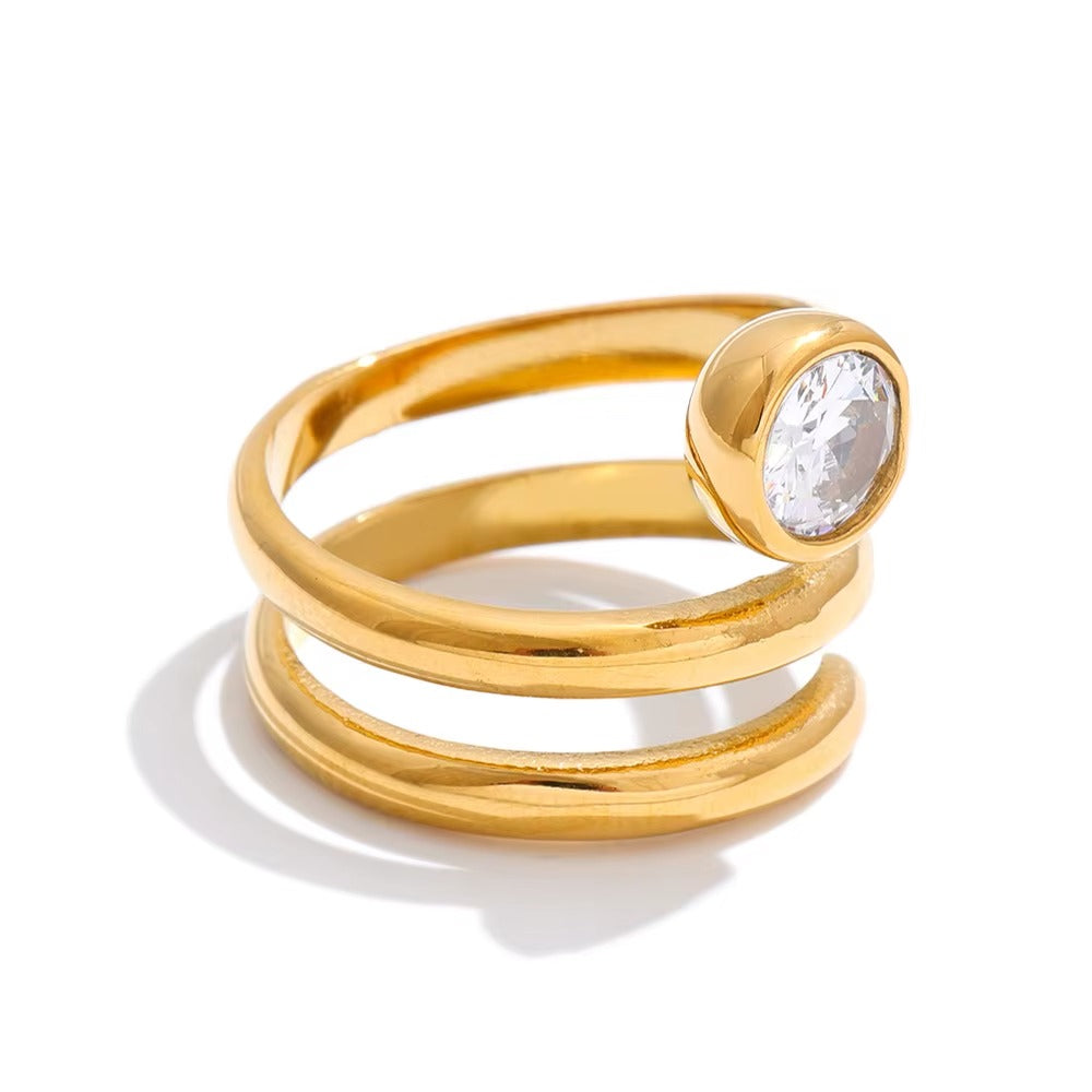 Glow Spiral Ring – gold ring with cubic zirconia stones