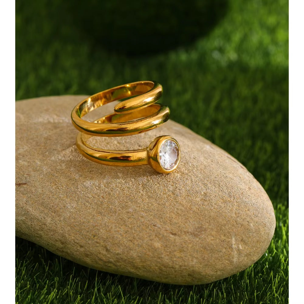 Glow Spiral Ring – gold ring with cubic zirconia stones