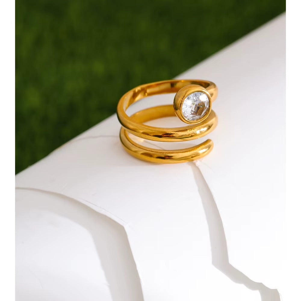 Glow Spiral Ring – gold ring with cubic zirconia stones