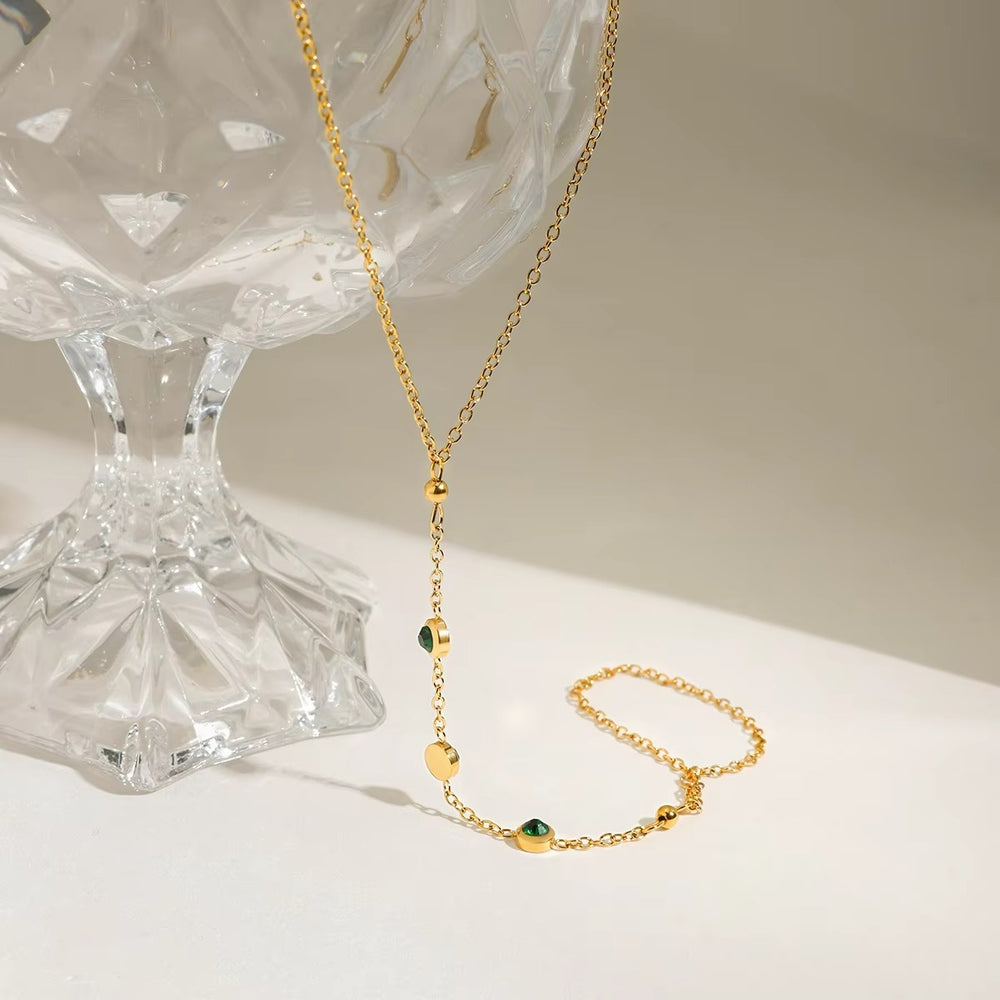 Emerald Link Hand Chain – gold hand chain with cubic zirconia stones