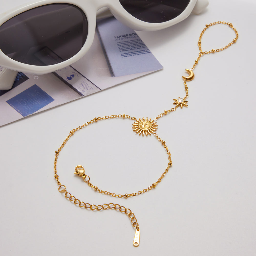 Celestial Chain Bracelet – gold hand chain with sun, moon and star charms