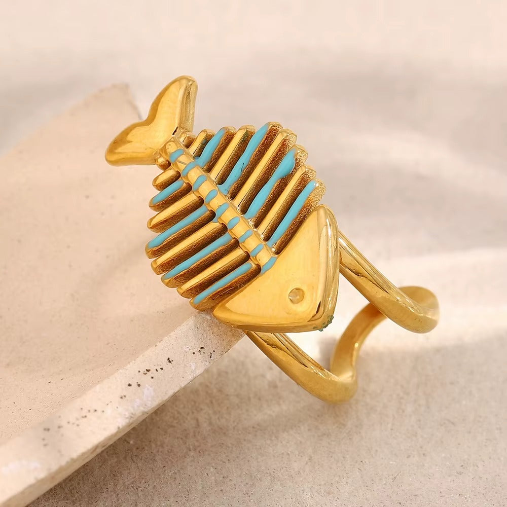 Lucky Fish Ring – adjustable gold fishbone ring with turquoise accents