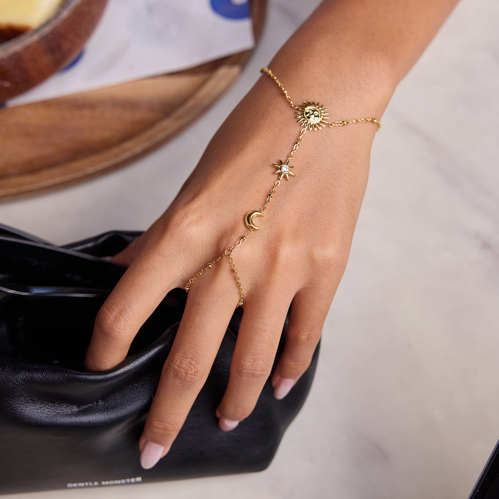 Celestial Chain Bracelet – gold hand chain with sun, moon and star charms