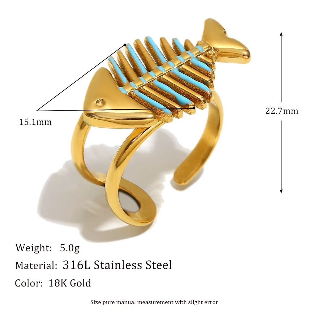 Lucky Fish Ring – adjustable gold fishbone ring with turquoise accents