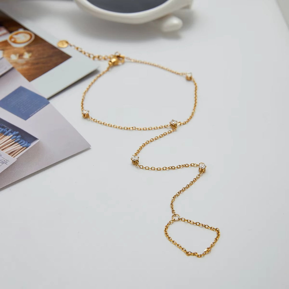 Minimal Spark Hand Chain – gold hand chain with cubic zirconia stones