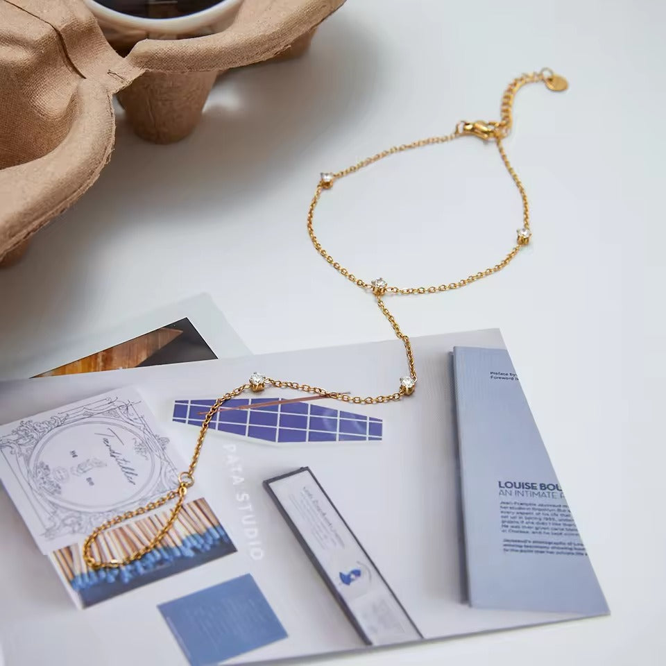 Minimal Spark Hand Chain – gold hand chain with cubic zirconia stones